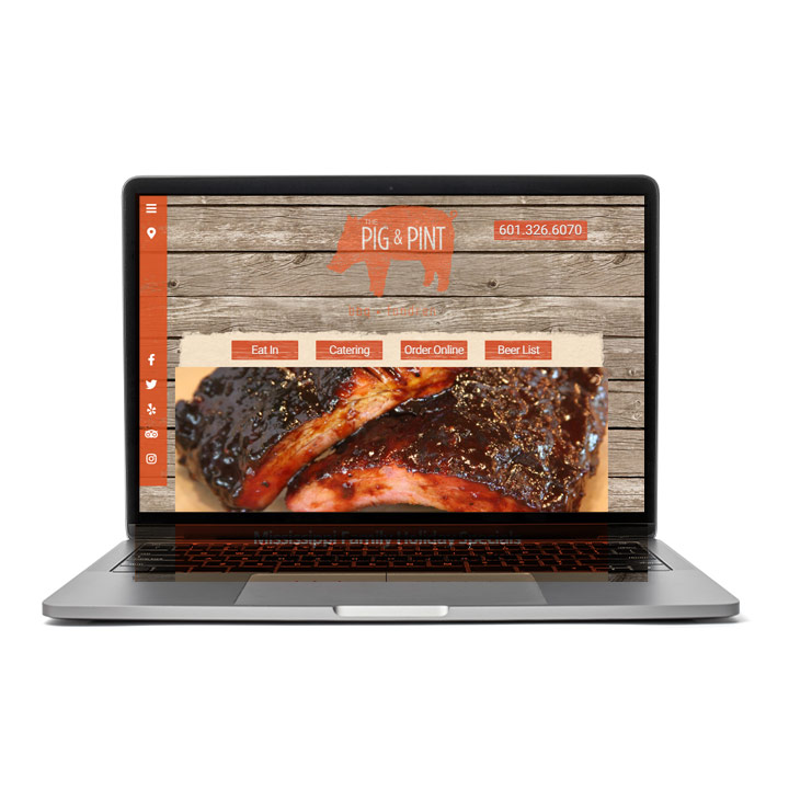 Pig and Pint Website on a Laptop Screen